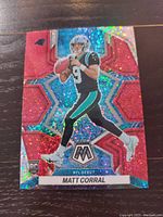 Front of Matt Corral Mosaic rookie card showing holographic pattern and player image in Carolina Panthers uniform.