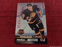 Pavel Bure Team Pinnacle Clarence Campbell Conference hockey card on red fabric background.