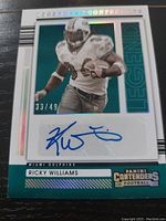 Front of the Panini Legendary Contenders football card showing Ricky Williams in Miami Dolphins uniform, numbered 33/49 with a clear blue autograph on white patch.