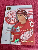 Front side of the Steve Yzerman hockey card showing player image, Detroit Red Wings logo, facsimile signature, and card numbering