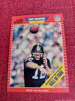 Front view of Terry Bradshaw CBS Sports NFL trading card showing player action photo with card branding and Hall of Fame membership.