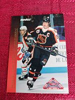 Close-up photo of the 1993 NHL All Star Game Wayne Gretzky Pinnacle hockey card showing the front side with Gretzky in action.