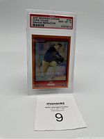 Front side of 2007 Bowman Chrome Chris Young Orange Refractor card graded PSA 10 in protective slab.