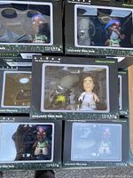 View of all nine boxed twin packs of Alien Nostromo Collection figures, showing the packaging and some figures clearly visible through plastic windows.