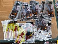 Overview of multiple movie film cell bookmarks, packed with backing cards from Harry Potter and Carrie visible.