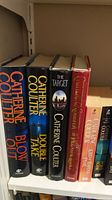 Photo of hardcover books by Catherine Coulter including Blow Out, Double Take, The Target, First Horseman.