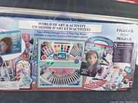 Front and back of the Frozen II art and activity set box showing branding and contents.
