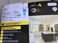 Front image of product packaging showing brand Vision Home, wattage 12 watts, brightness 800 lumens, five adjustable color temperatures, and pack of 4 lights with key product features.