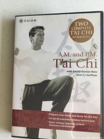 DVD case cover showing Tai Chi instructor performing a pose and promoting two complete workouts.