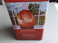 Photo of the Mountain Gold Himalayan Salt Crystal Lamp box showing branding and lamp image.