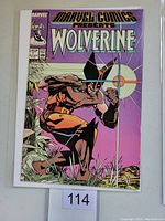 Front cover of Marvel Comics Presents Wolverine #1 comic book showing Wolverine crouching in a swamp with a purple sky and target symbol in background.
