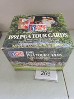 Sealed unopened 1991 Pro Set PGA Tour Golf Cards box with original shrink wrap intact, showing front and side graphics.