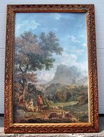 Framed antique pastoral landscape art print featuring sheep grazing and figures under trees, with distant mountains and sky.