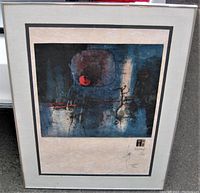 Full front view of framed lithograph leaning against surface