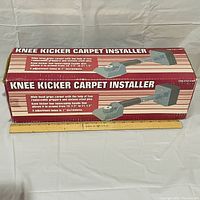 Box of Knee Kicker Carpet Installer showing product labeling and details.