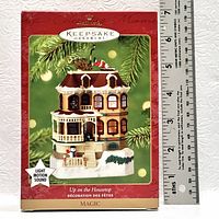 Photo of the Hallmark Keepsake Ornament original box with design and size reference via ruler