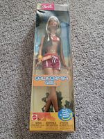 Front view of California Girl Barbie doll in original packaging showing the doll and brand labels.