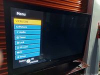 Panasonic plasma TV powered on showing VIERA menu screen with options for Picture, Audio, Timer, Lock, SD card, CC, and Setup.