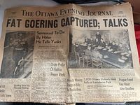 Front page of The Ottawa Evening Journal dated May 9 1945 with headline 'Fat Goering Captured; Talks'. Shows slight age tattering and yellowing, text remains readable.