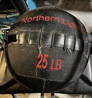 Top view showing Northern Lights branding in red and weight indication of 25 LB with some wear on the fabric and seams.