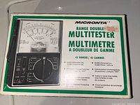 Micronta Range Doubler Multitester in original box showing front image and product information including 43 ranges and specifications on box front.