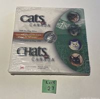 Front photo of sealed Cats of Canada 1999 sterling silver 50 cent coin package featuring Cougar design.
