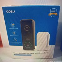 Factory packaging of one AOSU video doorbell and Wi-Fi Home Base showing product features on box front.