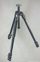 Full view of Manfrotto 290 Xtra Tripod extended showing leg sections and head mount.