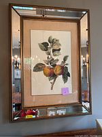 Frontal view of the full framed print showing the entire artwork with mirrored frame and wall reflection