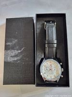 Watch and black presentation box
