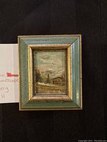 Front view of the framed miniature landscape painting by John Strandberg showing the artwork and frame.