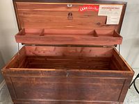 Open Lane cedar chest showing the cedar wood interior and removable tray with compartments.