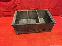 Full view of vintage wooden box showing interior compartments and Santa Clara Prunes branding on side.