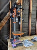 Side view of Wen 8 inch 5-speed drill press mounted on wood workbench