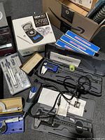 Overview of scale boxes, digital caliper cases, diamond tester boxes and ring clamp