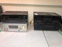 Top view showing the four stereo components stacked, with Sony receiver on top and Kenwood amplifier and cassette deck below.