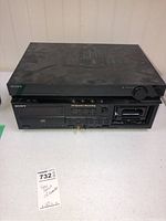 Full view of the two stacked Sony units showing front panels with buttons, cassette, and CD recorder.