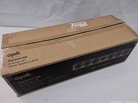 Sealed retail box with Polk Signature S35 branding printed on cardboard