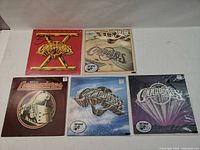 Top view of the 5 Commodores vinyl LP album covers showing front artwork and condition.