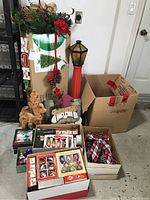 Overall group shot showing tree box, garlands, lamp post, wooden decor, ornament and pick boxes