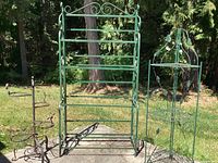 All three rustic plant stands displayed outdoors on a concrete pad with lawn and trees in background
