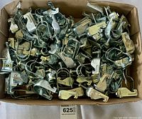 Box containing over 50 steel conduit and cable clamps of Superstrut Cobra type.