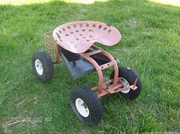 Garden cart wagon with perforated metal swivel seat, four large tires, and small rear basket photographed on grass from various angles.