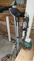 Side view of Thule bike rack attached and resting with crowbar hanging on it.