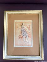 Full view of framed etching showing the art piece and gold-tone frame