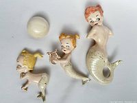 Full view of all three mermaid figurines and one round bubble element