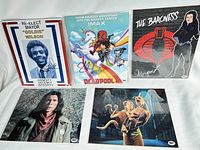 Five autographed photos of actors including Lou Diamond Phillips, Matthew Lillard, Stefan Kapicic, Donald Fullilove, and Morgan Lofting with visible signatures and COAs