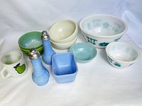 Complete set of glassware and kitchenware items showing all bowls, mug, and shakers.