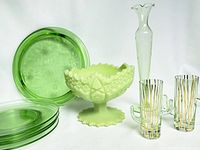 Full set showing custard glass bowl, green depression glass plates, clear glass vase, and green cactus shot glasses