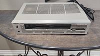 Front view of Technics SA-310 stereo receiver showing full faceplate and controls.
